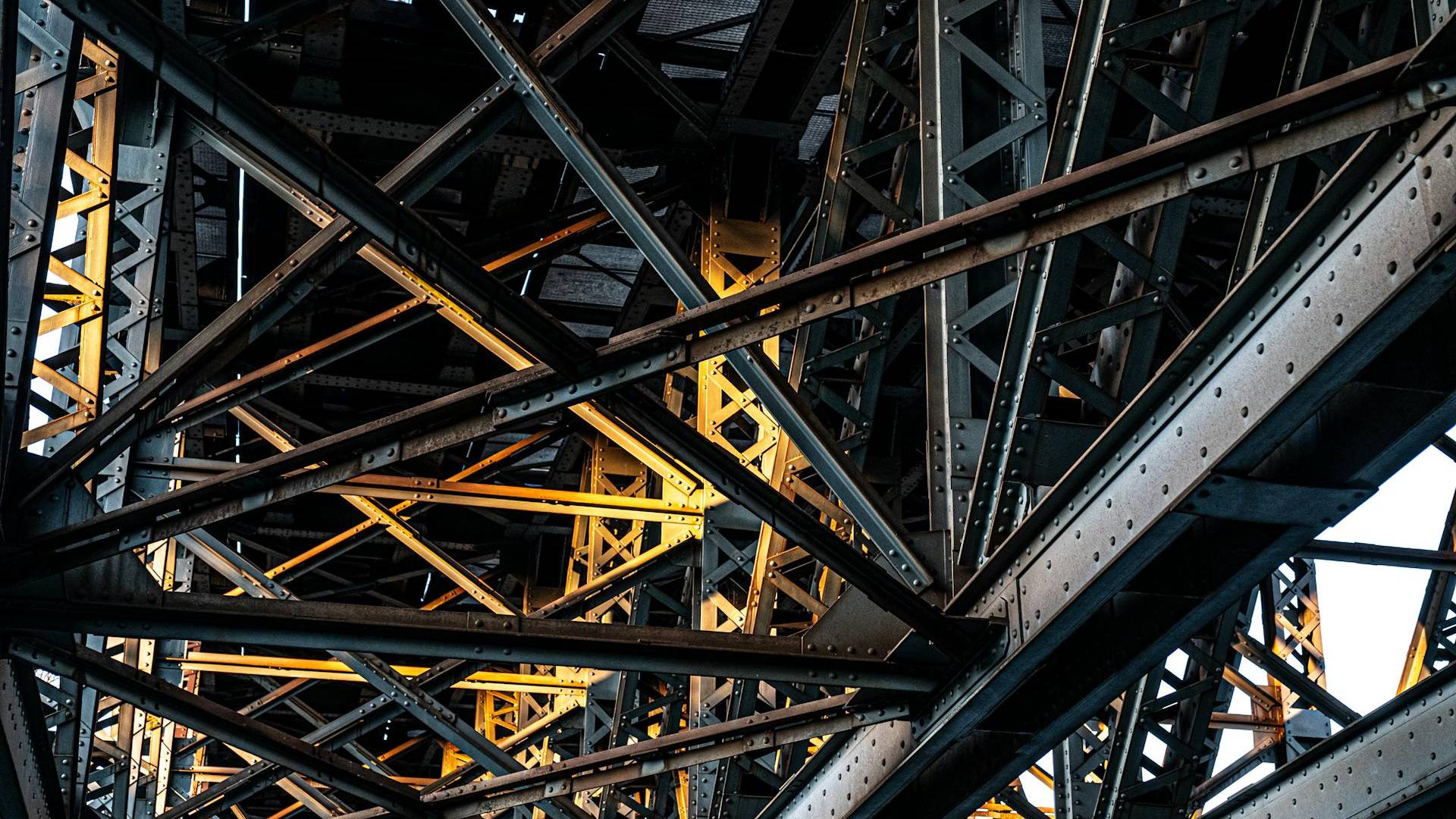 Looking up into a riveted structural steel frame