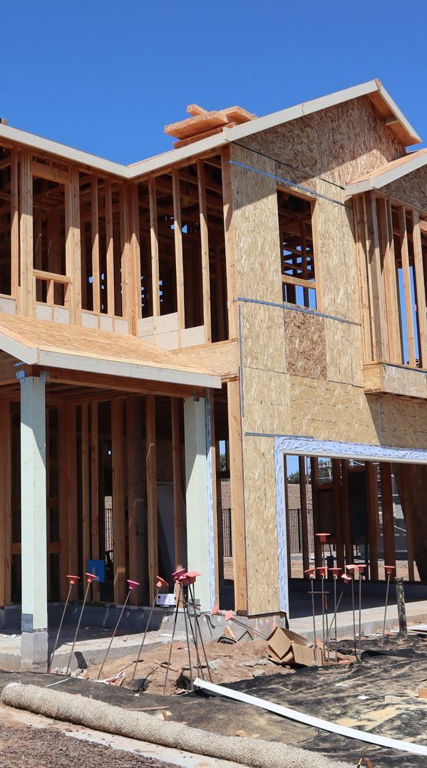 Two-storey timber-framed house under construction